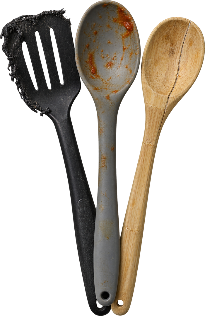 Melted plastic spatula, stained silicone spoon and cracked bamboo spoon