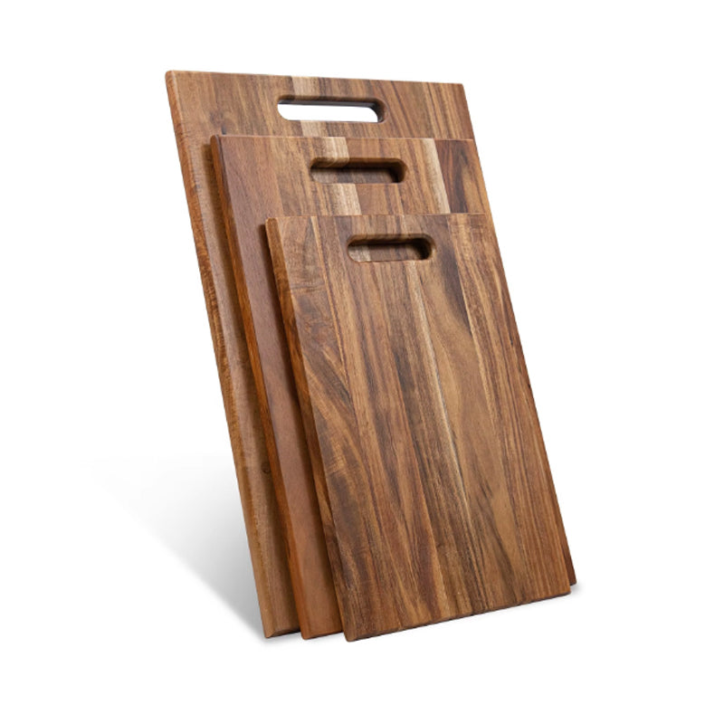 Three acacia cutting boards with handles in S, M and L