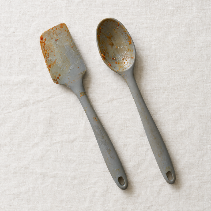 Stained grey silicone spatula and spoon