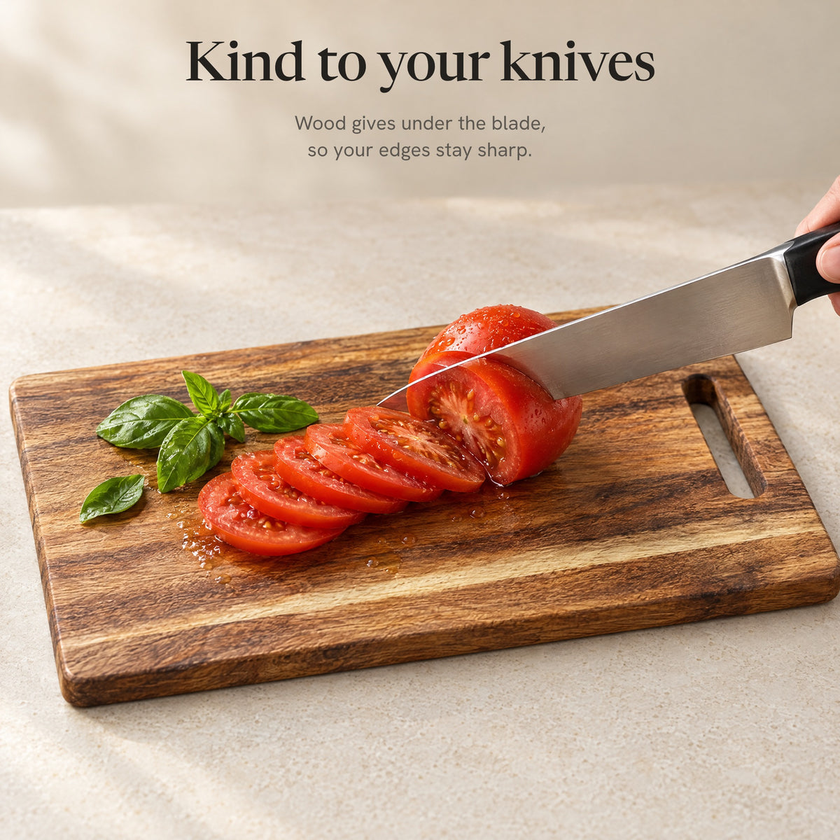 Kind to your knives: slicing a tomato on the acacia board