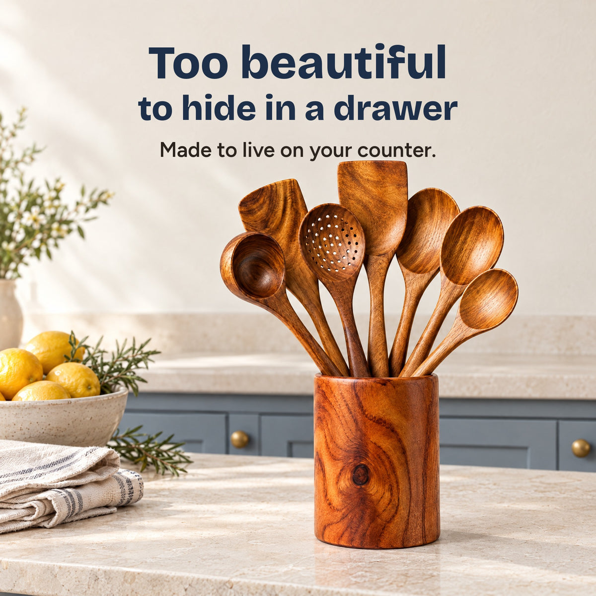 Too beautiful to hide in a drawer: the teak set in its holder on a kitchen counter