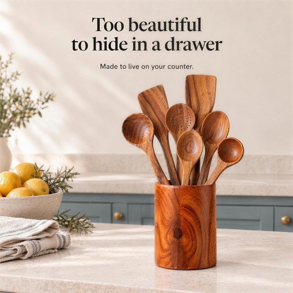 Too beautiful to hide in a drawer: the acacia set in its holder on a kitchen counter