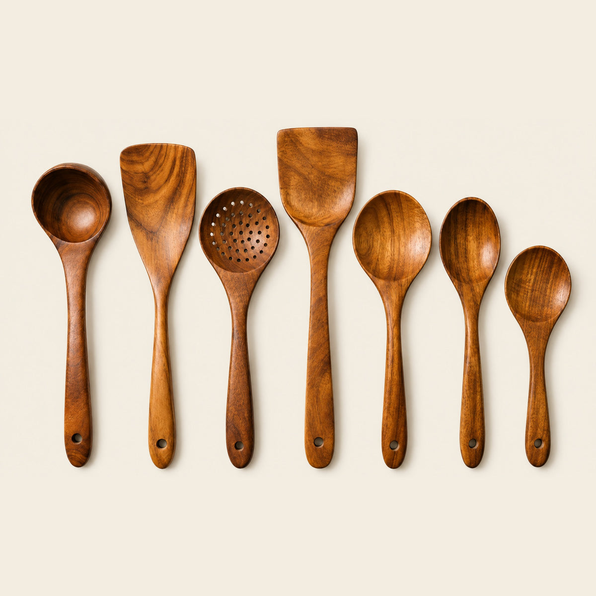 7-piece teak utensil set laid out